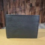 RFID Blocking Genuine Leather Slim Wallet for Men, closed view showing premium black litchi texture and fine stitching. wolveyes
