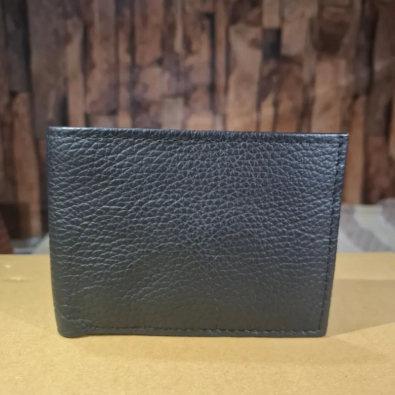 RFID Blocking Genuine Leather Slim Wallet for Men, closed view showing premium black litchi texture and fine stitching. wolveyes